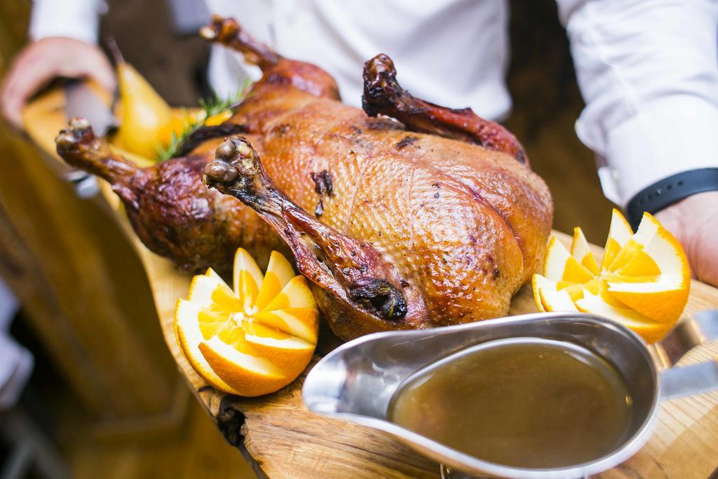 Hotel Gdańsk Boutique Extérieur photo A roast duck with orange sauce